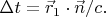 $\Delta t =\vec{r}_1 \cdot \vec{n}/c.$