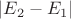$\left\lvert E_2-E_1\right\rvert$