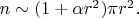 $n\sim(1+\alpha r^2)\pi r^2.$