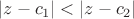 $|z - c_1| < |z - c_2|$