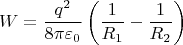 $$W=\frac{q^2}{8\pi\varepsilon_0}
\left(\frac1{R_1}-\frac1{R_2}\right)$$