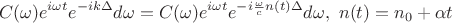 $$C(\omega)e^{i\omega t}e^{-ik\Delta}d\omega=C(\omega)e^{i\omega t}e^{-i\frac{\omega}{c}n(t)\Delta}d\omega,\ n(t)=n_0+\alpha t$$