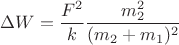 $$\Delta W = \frac{F^2}{k}\frac{m_2^2}{(m_2 + m_1)^2}$$
