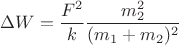 $$\Delta W = \frac{F^2}{k}\frac{m_2^2}{(m_1 + m_2)^2}$$