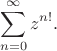 $$
\sum_{n=0}^\infty z^{n!}.
$$