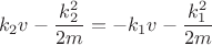 $$k_2v-\frac{k_2^2}{2m}=-k_1v-\frac{k_1^2}{2m}$$