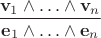 $\dfrac{\mathbf v_1\wedge\ldots\wedge\mathbf v_n}{\mathbf e_1\wedge\ldots\wedge\mathbf e_n}$