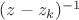 $(z-z_k)^{-1}$